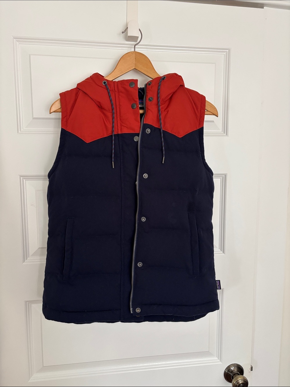 Patagonia Women’s Bivy Vest. Colorblock Navy and Rust Orange. Size XS